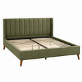 Cama doble de madera y tela verde con cabecero
